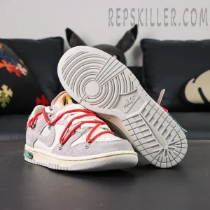 Off-White x Nike Dunk Low Lot 33 of 50 sneakers showing outsole and upper with grey suede and cream leather.