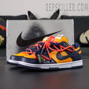 Off-White x Nike Dunk Low University Gold sneakers with silver Nike box in the background