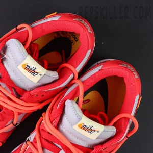 Close-up of the toe box on the Off-White x Dunk Low “University Red,” revealing premium leather, perforation details, and contrasting lace overlay.