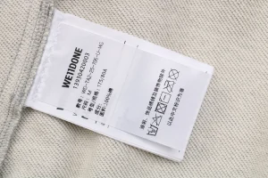 We11done Distressed Letter Sweatpants Wash label