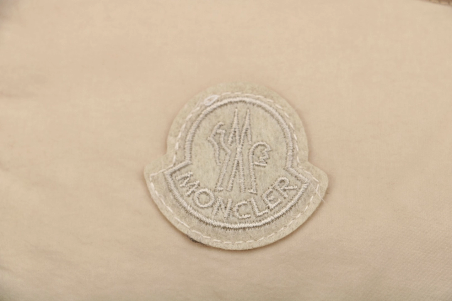 Mxxcler Dual-Zip Side Pocket Hooded Down Jacket Beige Brand label