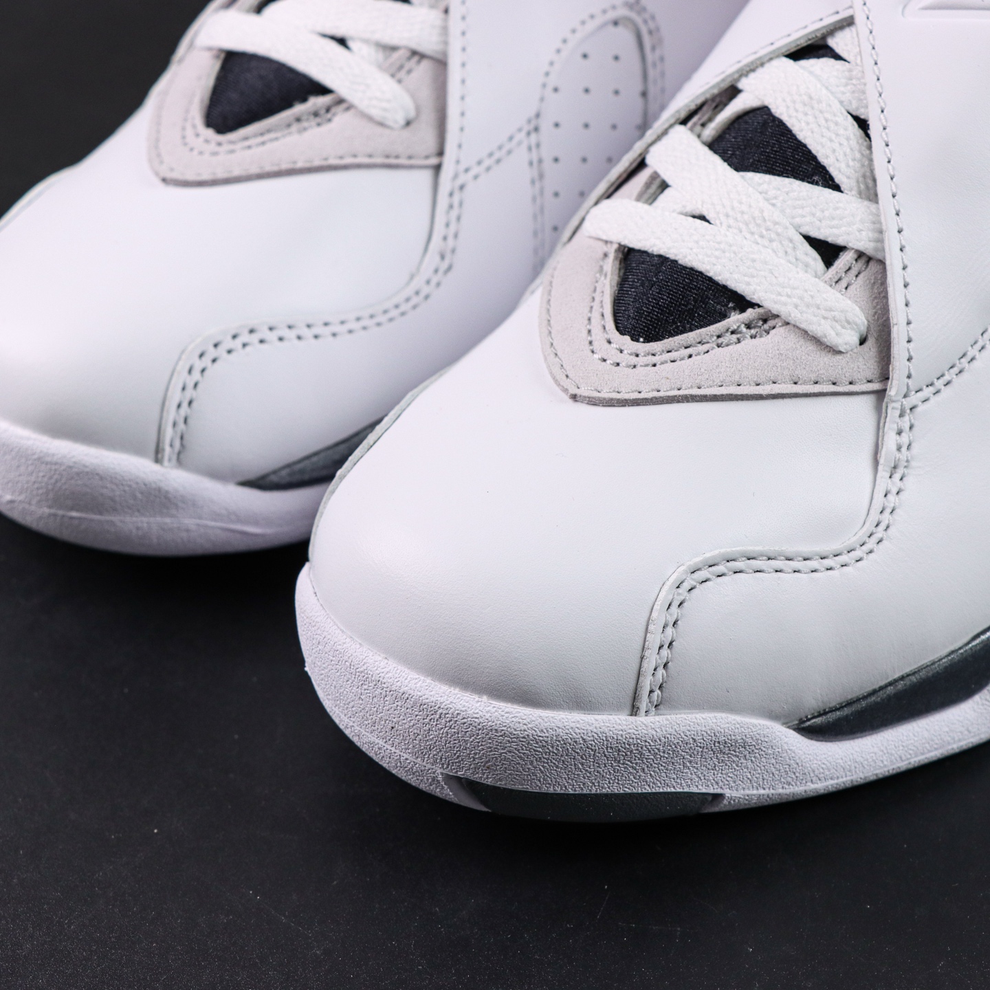 Air Jordan 8 Retro “Bugs Bunny” toe box detail with white leather stitching