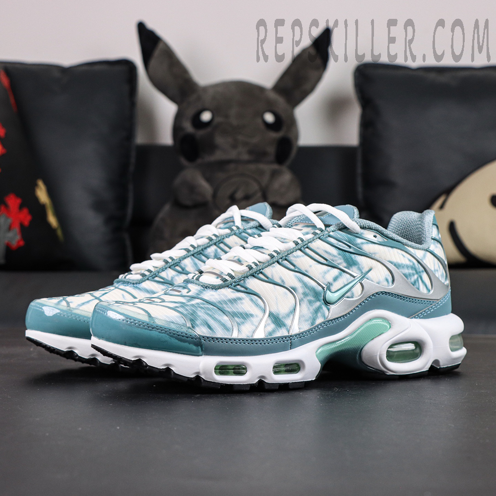 Nike Air Max Plus Palm Pack Waterway angled front view with aqua water-pattern upper