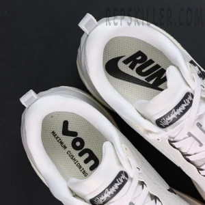 Nike Vomero Plus Run Pack running shoes insole logo and cushioning detail