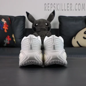 Nike Vomero Plus Run Pack running shoes rear view and outsole structure