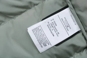 Nike x Drake NOCTA Stand Collar Down Jacket Wash label