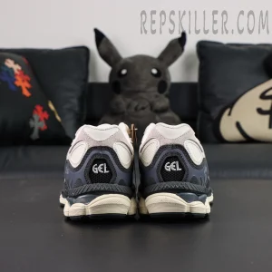 ASICS Gel NYC “White Smoke Grey” sneakers, straight rear view showing GEL cushioning and GCL heel branding