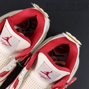 Air Jordan 4 Retro “Valentine’s Day” basketball shoes, top-down view showing Jumpman tongue logo and red inner lining