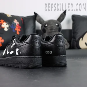 BLACK Comme des Garçons x Nike Air Force 1 Low black collaboration sneakers, heel view with Nike Air embossing and CDG logo