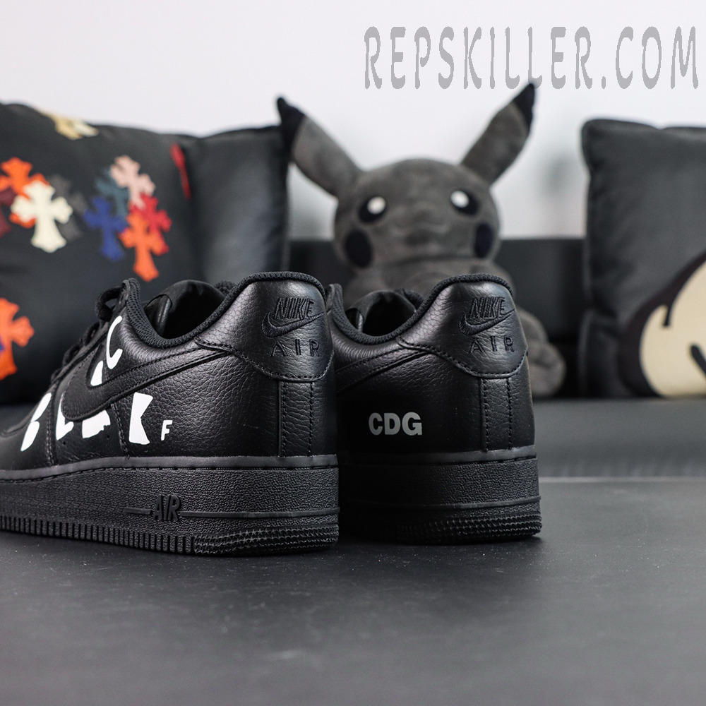 BLACK Comme des Garçons x Nike Air Force 1 Low black collaboration sneakers, heel view with Nike Air embossing and CDG logo
