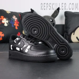 BLACK Comme des Garçons x Nike Air Force 1 Low black collaboration sneakers, outsole view with circular traction pattern