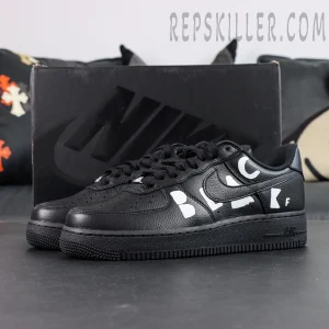 BLACK Comme des Garçons x Nike Air Force 1 Low black collaboration sneakers displayed with original black shoebox