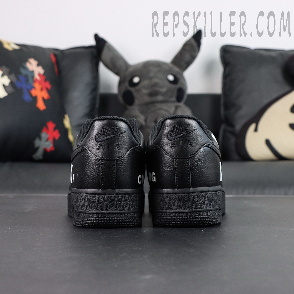 BLACK Comme des Garçons x Nike Air Force 1 Low black collaboration sneakers, rear view with asymmetric CDG and Nike Air branding