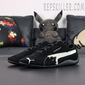 Balenciaga x Speedcat Suede Black White sneakers, front side angle showing low-cut streamlined design