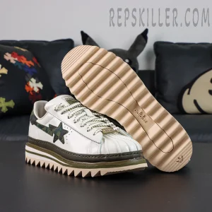 CLOT x BAPE x adidas Superstar “Off White Olive Cargo” sneakers, outsole-up view showing serrated traction pattern and adidas branding