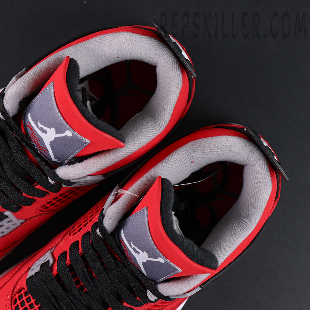 Top-down view of the Jordan 4 Toro Bravo showing padded collar, black laces, and Jumpman tongue label