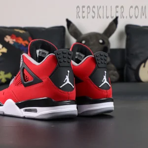 Rear angled view of the Jordan 4 Toro Bravo highlighting the black heel tab and white Jumpman logo