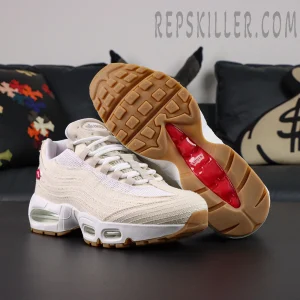 Levi’s x Nike Air Max 95 OG “Light Orewood Brown” outsole and side view featuring gum sole and red Levi’s branding