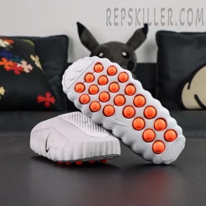 Nike Mind 001 Mule “Light Smoke Grey” mule shoes, outsole-up view with orange cushioning pods