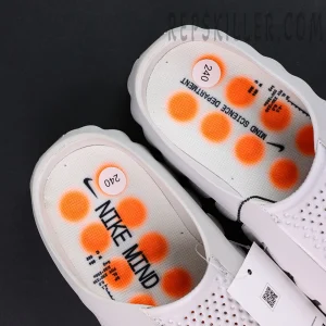 Nike Mind 001 Mule “Light Smoke Grey” mule shoes, insole close-up with Nike Mind branding and orange cushioning dots