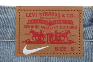 Nike Swoosh Embroidered Denim Trousers Brand label