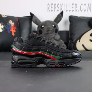 Undefeated x Nike Air Max 95 Black sneakers, side profile with UNDEFEATED red and green stripe
