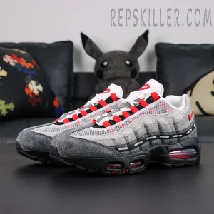 Undefeated x Nike Air Max 95 “Bright Crimson” sneakers, front-side angle showing grey suede upper with red accents