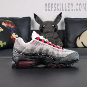 Undefeated x Nike Air Max 95 “Bright Crimson” sneakers, side profile with layered upper and red Air cushioning