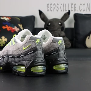 Undefeated x Nike Air Max 95 “NYC Neon” sneakers, rear view with Nike Air branding and visible Air unit