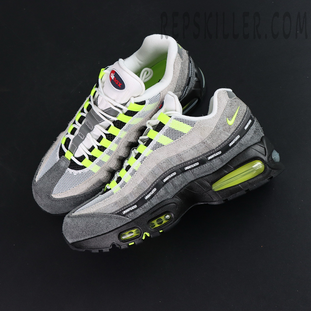 Undefeated x Nike Air Max 95 “NYC Neon” sneakers, floating angle showing overall silhouette and colorway