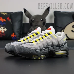 Undefeated x Nike Air Max 95 “Yellow” sneakers, front side angle showing grey suede upper and yellow accents
