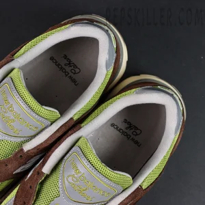 Daniëlle Cathari x Kith x New Balance 991v2 “Reverse” sneakers, top view showing tongue and inner lining details