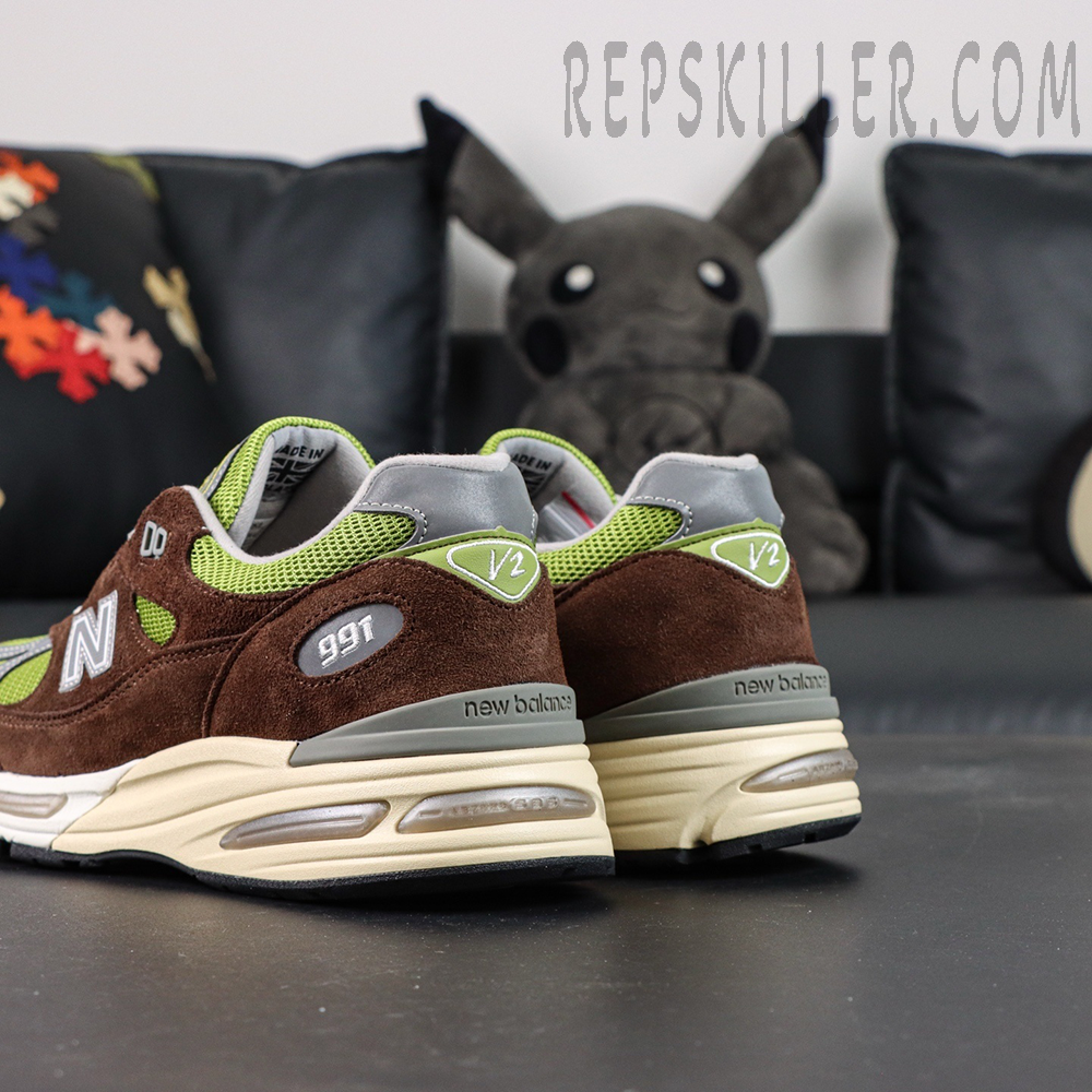 Daniëlle Cathari x Kith x New Balance 991v2 “Reverse” sneakers, rear-side angle highlighting heel and midsole