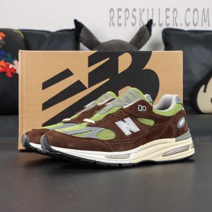 Daniëlle Cathari x Kith x New Balance 991v2 “Reverse” sneakers, full display with shoebox