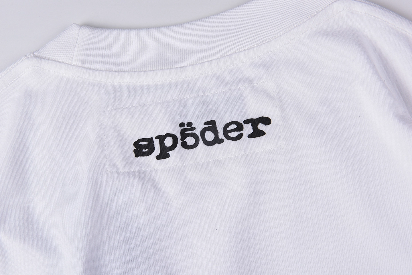 Sp5der White Distressed Arc Logo Graphic T-Shirt1