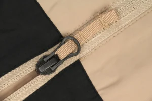 The North Face Retro Hidden Hood Windbreaker Jacket Brown Zipper puller