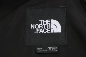The North Face Retro Hidden Hood Windbreaker Jacket Black Brand label