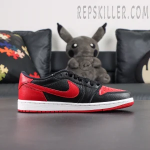 Air Jordan 1 Low side profile with contrasting red Swoosh on black upper