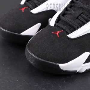 Air Jordan 14 toe box detail with black nubuck and red Jumpman embroidery